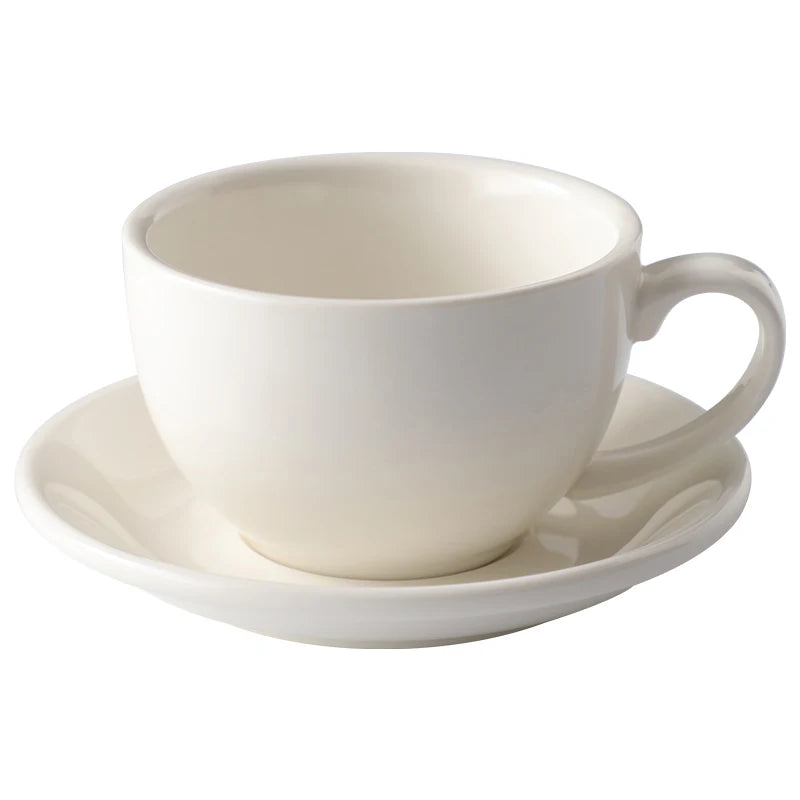 A classic white ceramic coffee cup with a matching saucer, photographed on a seamless white background.